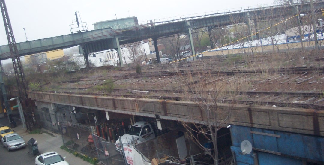 View from the A train of the southernmost part of the LIRR Rockaway Beach line trackbed. April 2013.